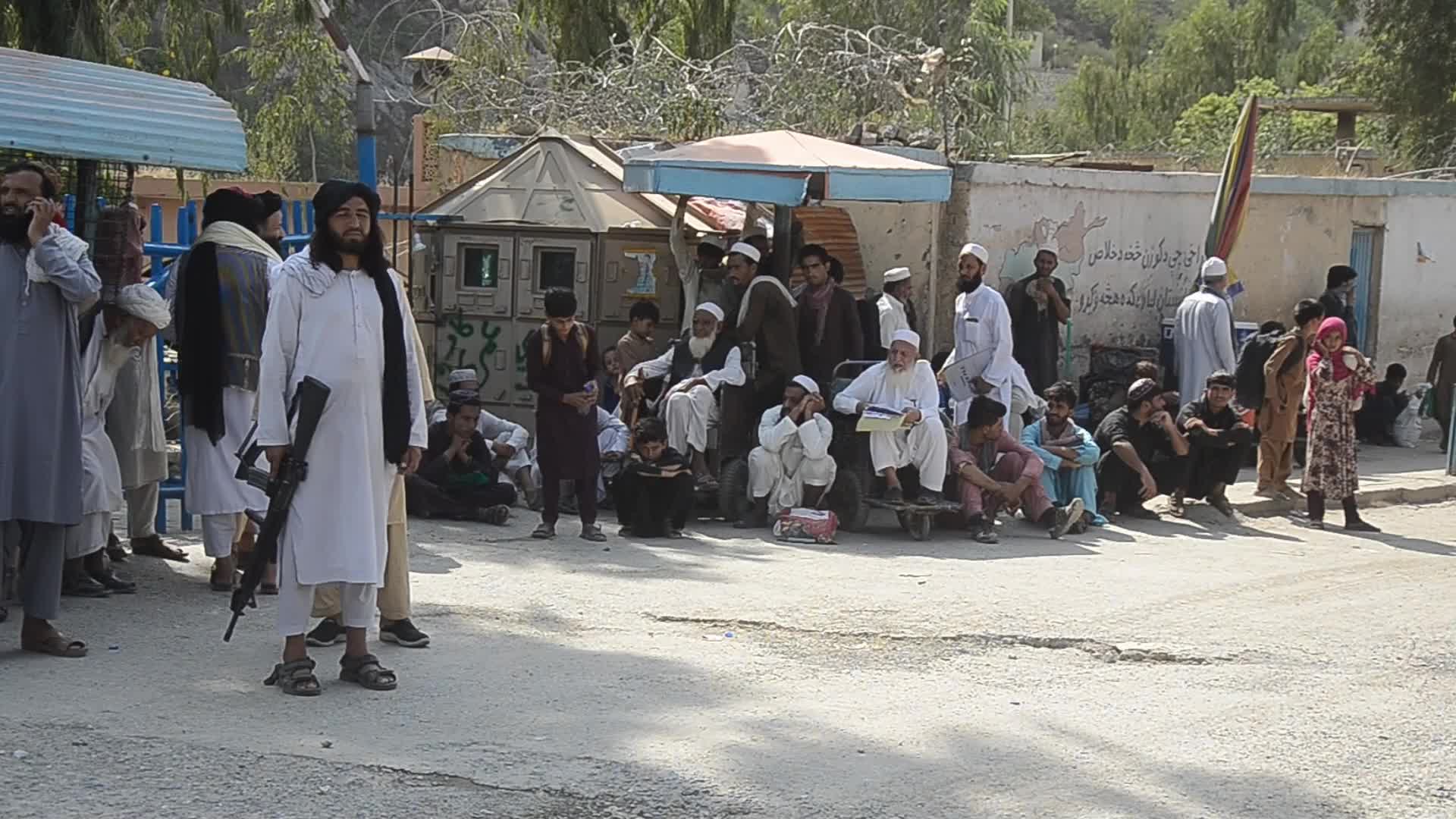Taliban fighters and Pakistani soldiers are now guarding the Torkham crossing side-by-side