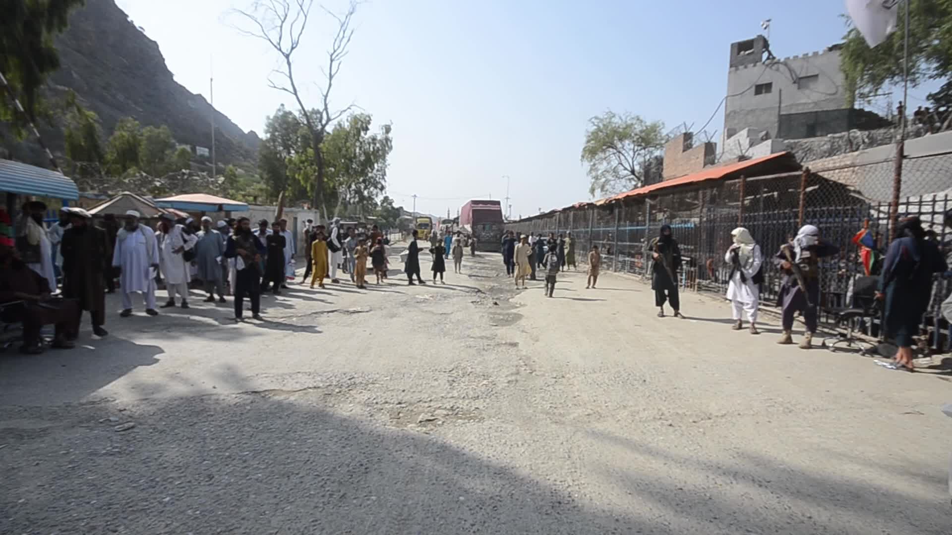 Taliban fighters and Pakistani soldiers are now guarding the Torkham crossing side-by-side