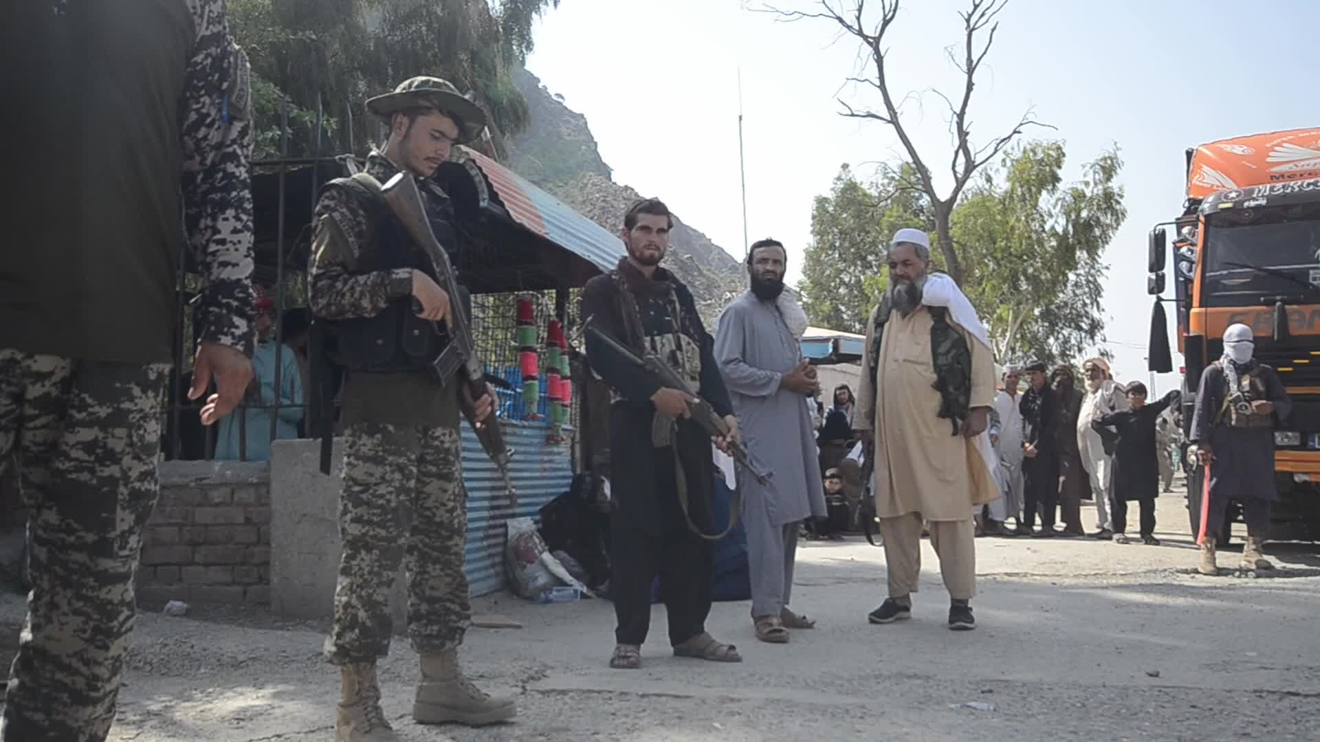 Taliban fighters and Pakistani soldiers are now guarding the Torkham crossing side-by-side