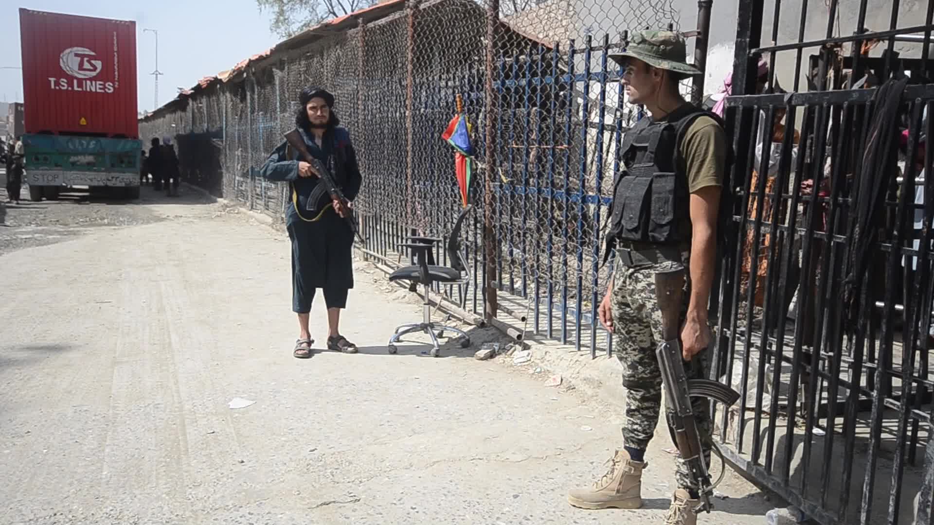 Taliban fighters and Pakistani soldiers are now guarding the Torkham crossing side-by-side