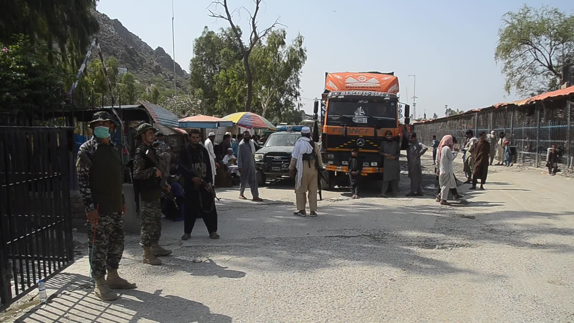 Taliban fighters and Pakistani soldiers are now guarding the Torkham crossing side-by-side
