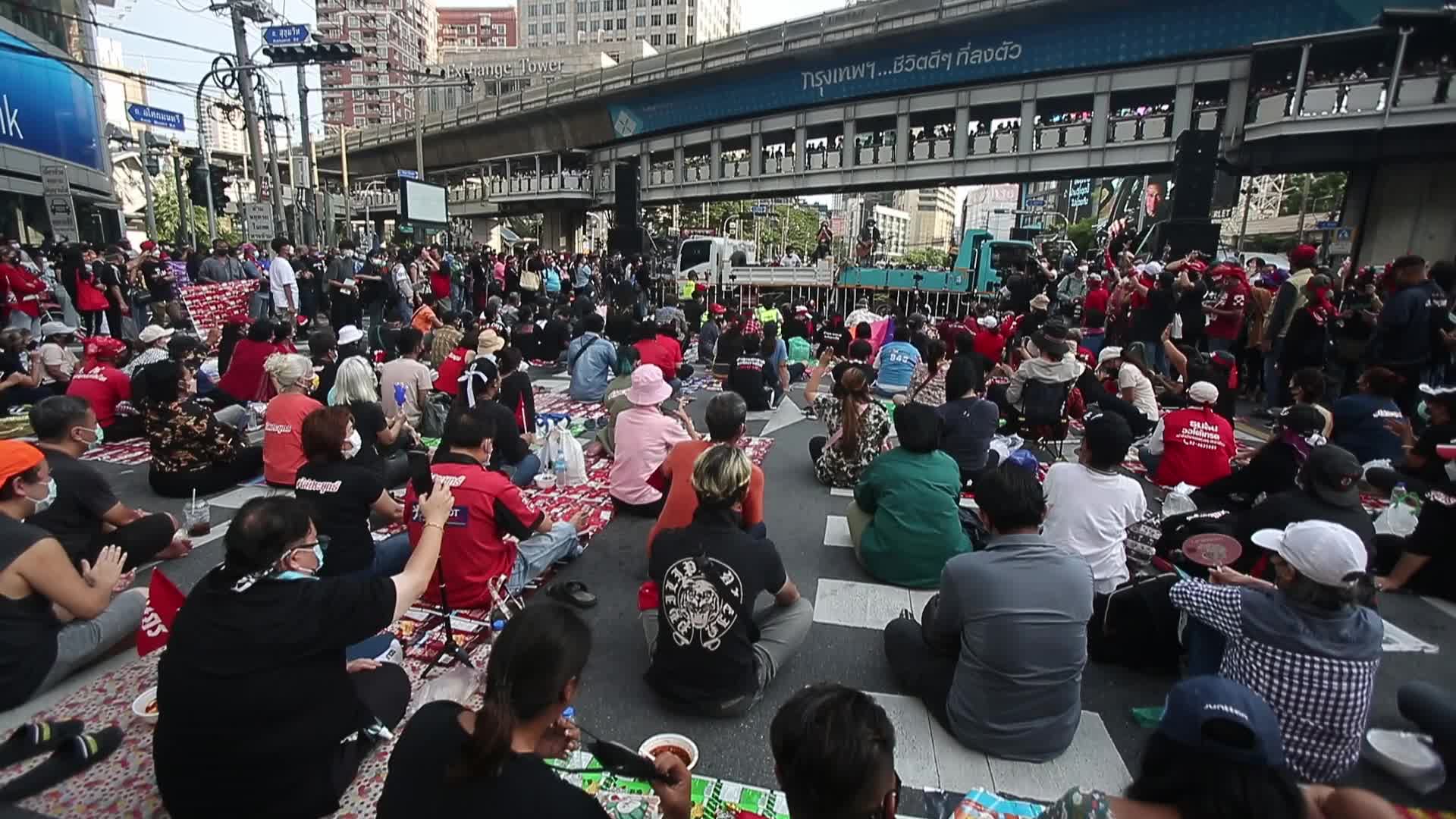 Pro-democracy protesters gather during the demonstration at Asoke intersection in Bangkok