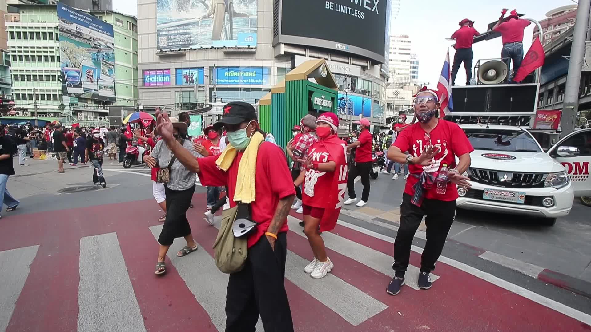 Pro-democracy protesters gather during the demonstration at Asoke intersection in Bangkok
