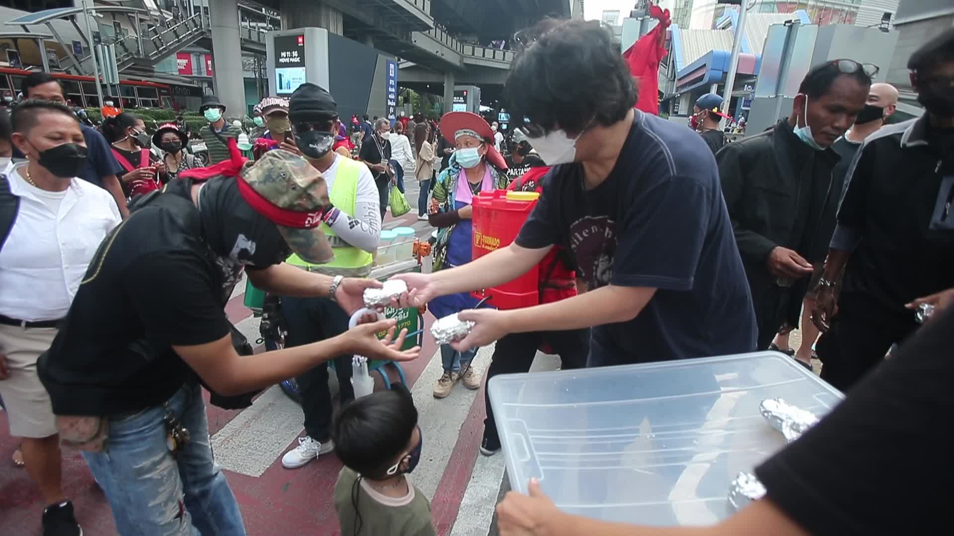 Pro-democracy protesters gather during the demonstration at Asoke intersection in Bangkok