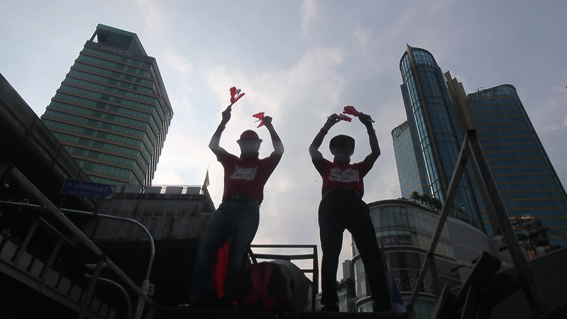 Pro-democracy protesters gather during the demonstration at Asoke intersection in Bangkok