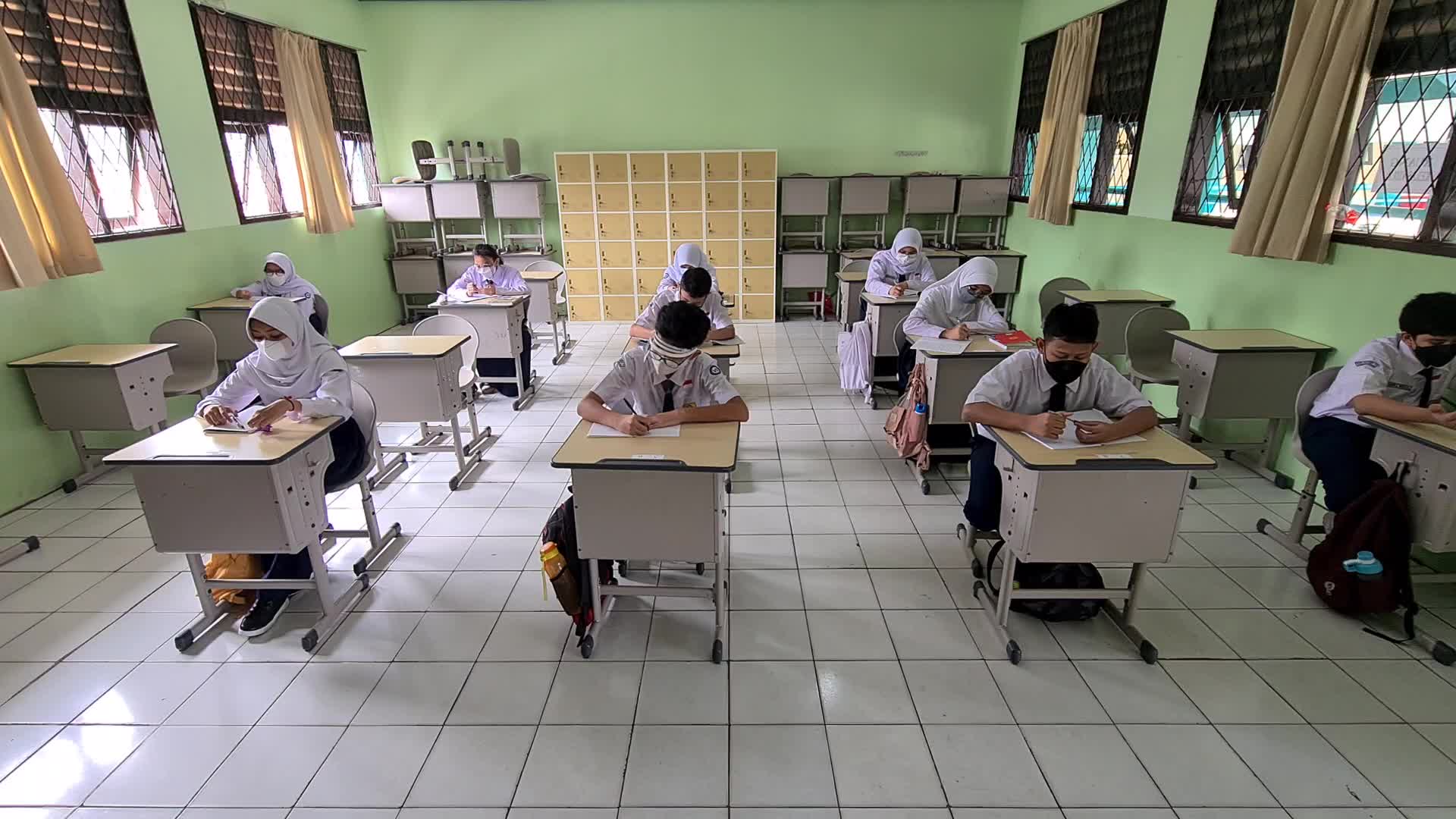 Students back to school as Indonesia eases Covid restrictions