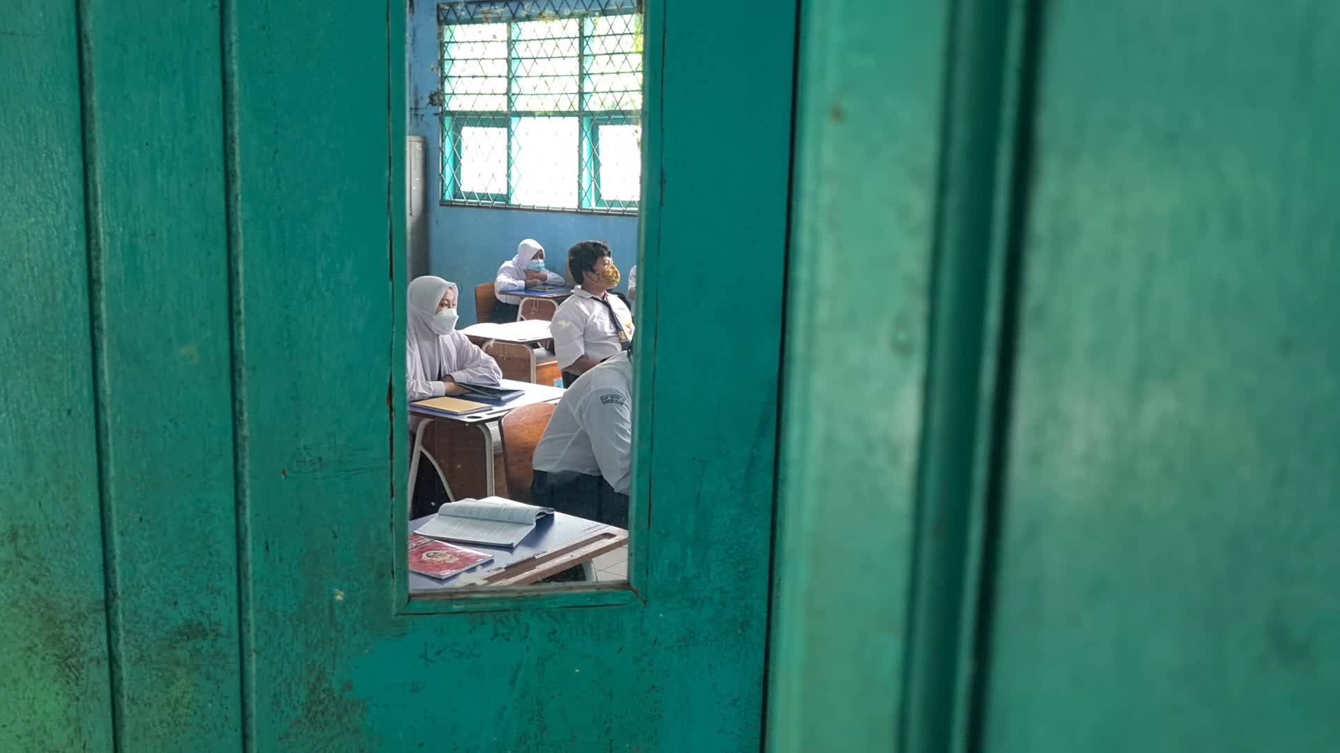 Students back to school as Indonesia eases Covid restrictions