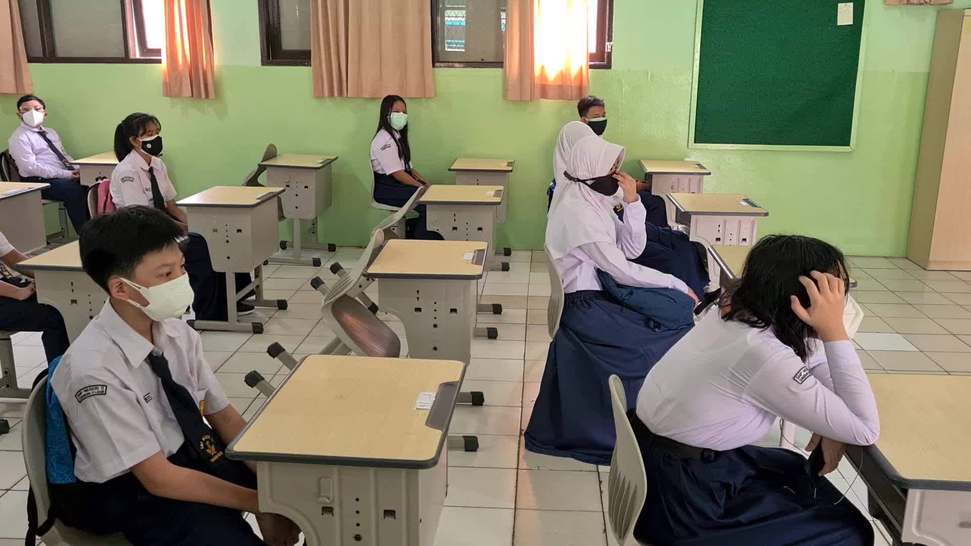 Students back to school as Indonesia eases Covid restrictions