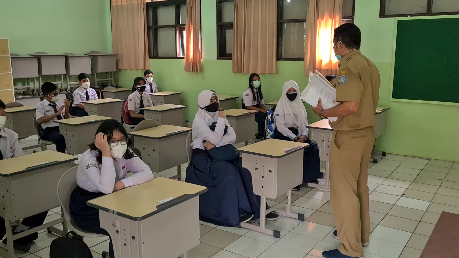 Students back to school as Indonesia eases Covid restrictions