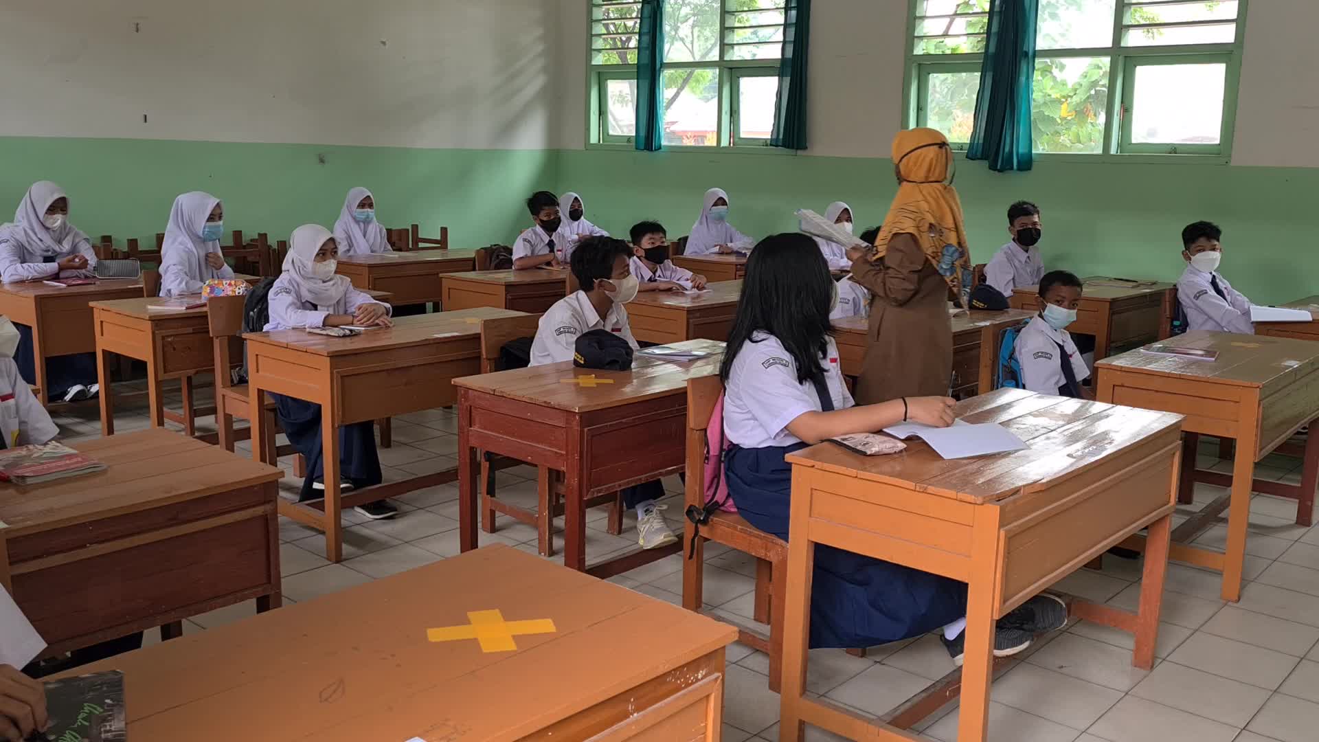Students back to school as Indonesia eases Covid restrictions