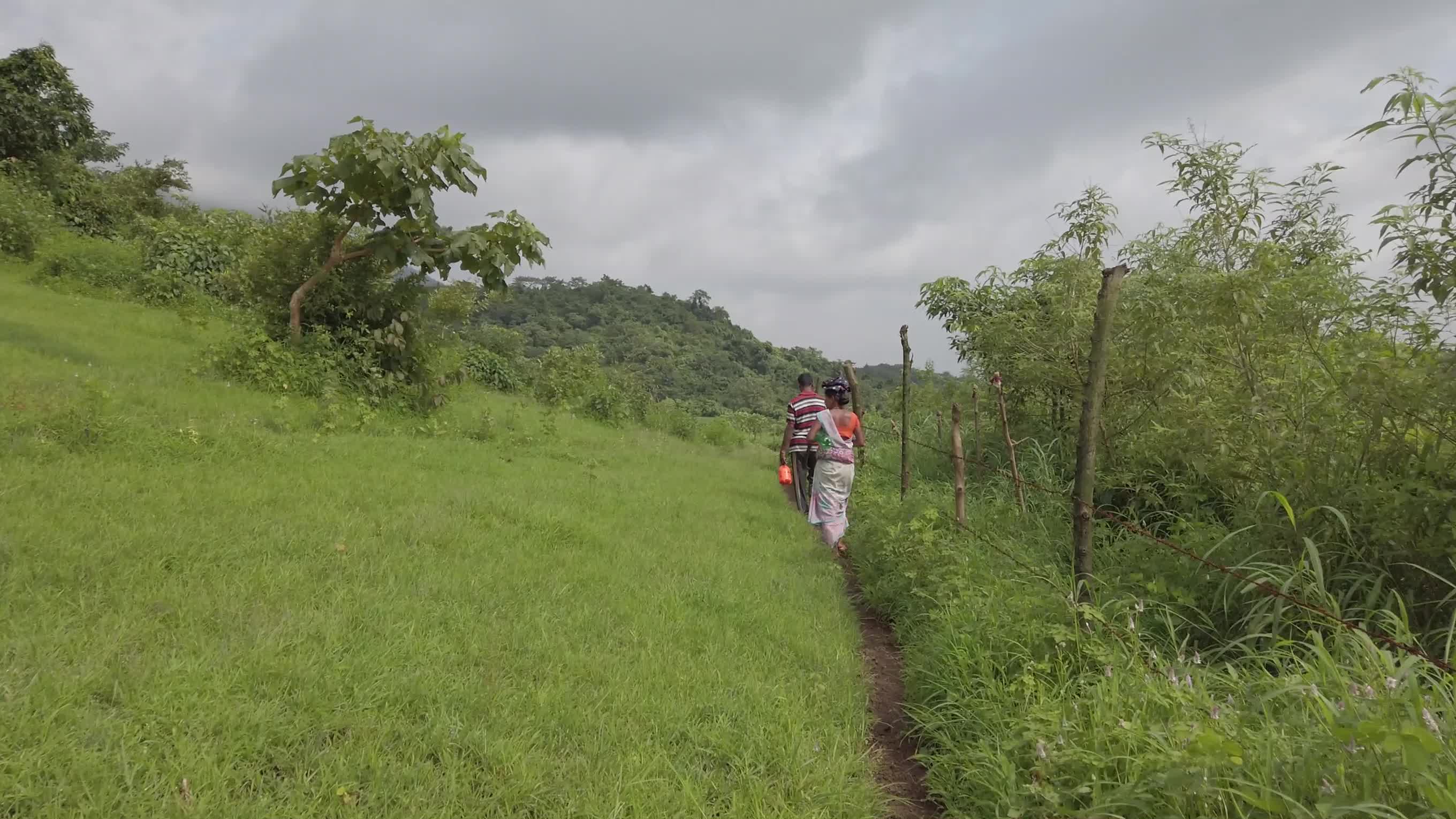 Farmers on the way to their Farms to do farm work 