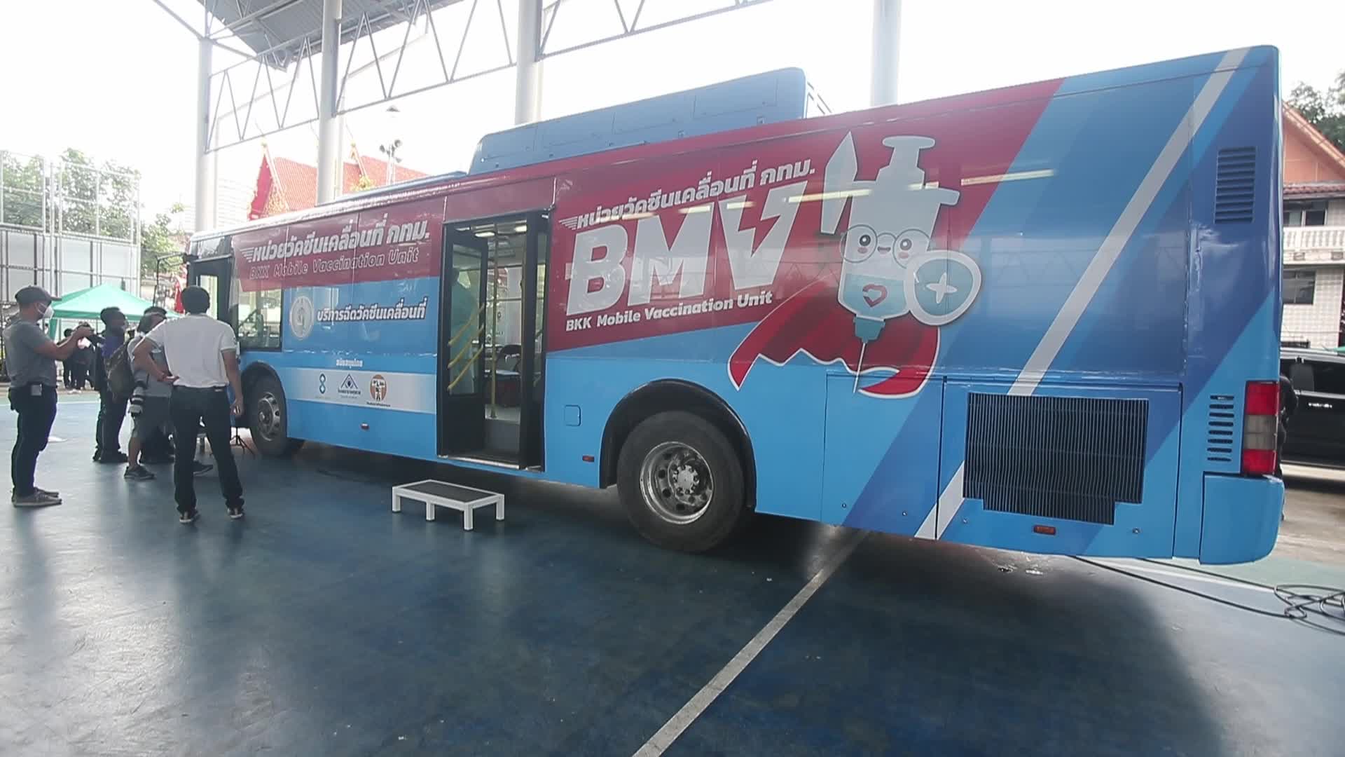 People get a dose of AstraZeneca vaccine on a BKK Mobile Vaccination Unit (BMV) vehicle in Bangkok