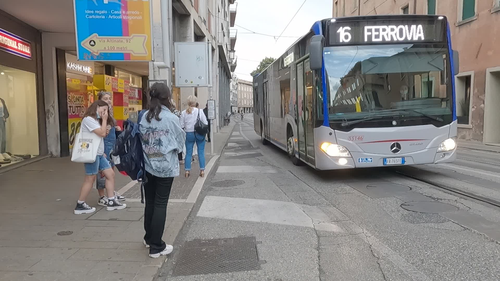 Citizens waiting for the bus on the Riviera Ponti Romani in Padua