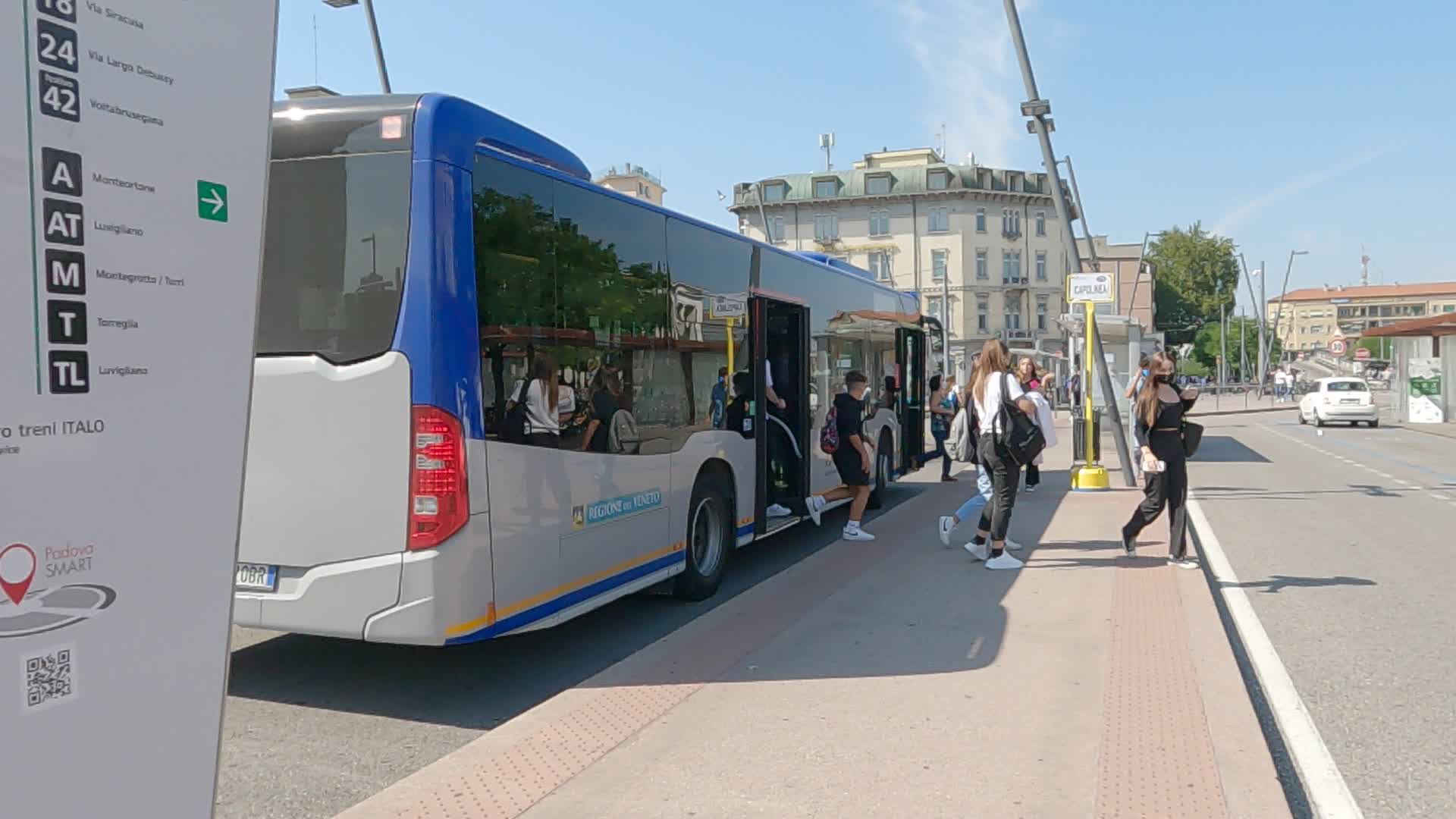 Students get off the bus at the padua station