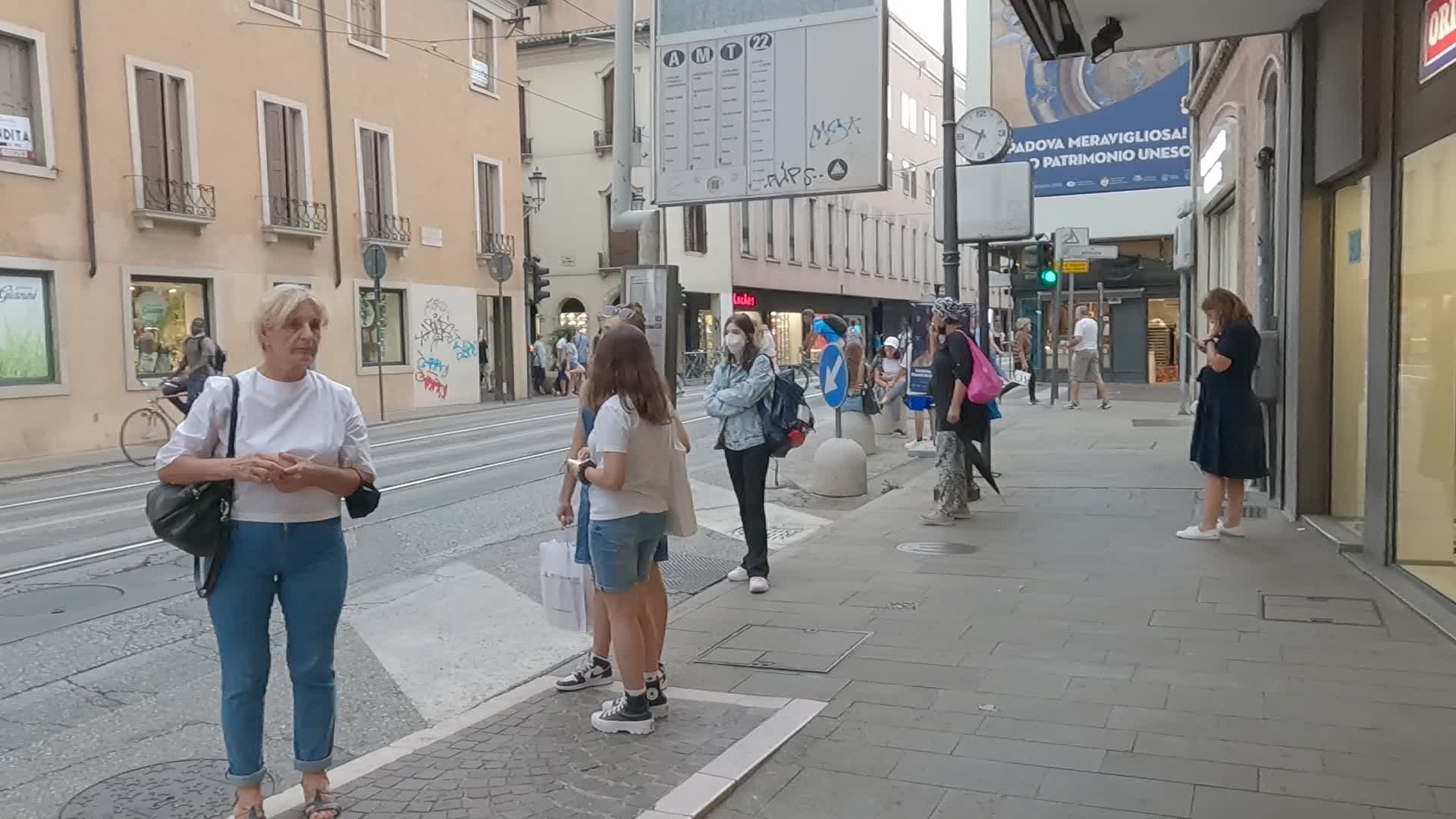Citizens waiting for the bus on the Riviera Ponti Romani in Padua