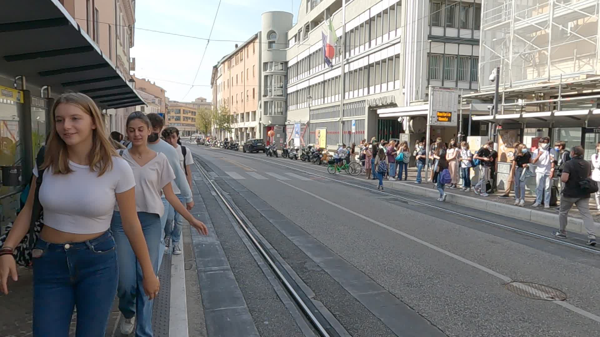 Students gathered in Rivia Tito Livio as they wait for the bus to go home