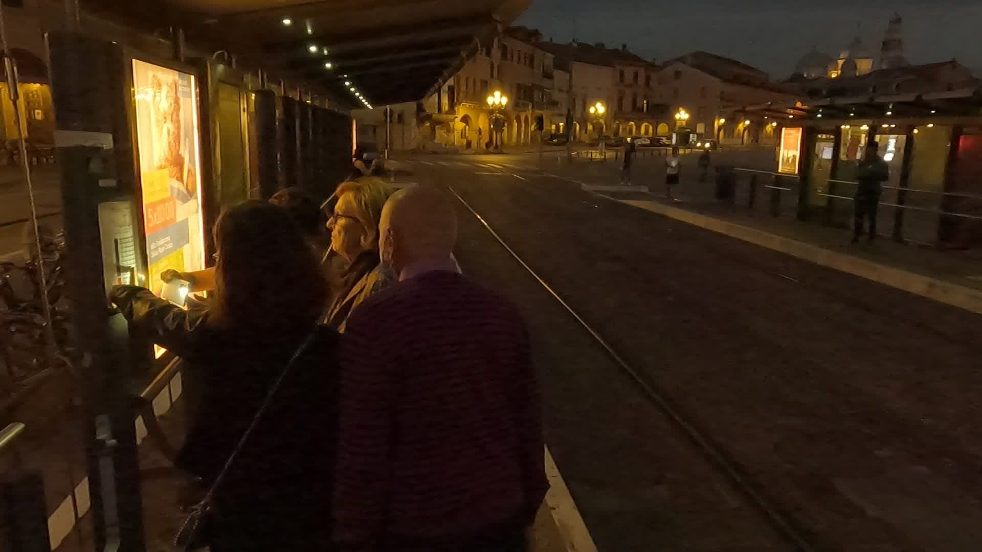 Tourists waiting for the night Tram (special ride) in Prato della Valle in Padua