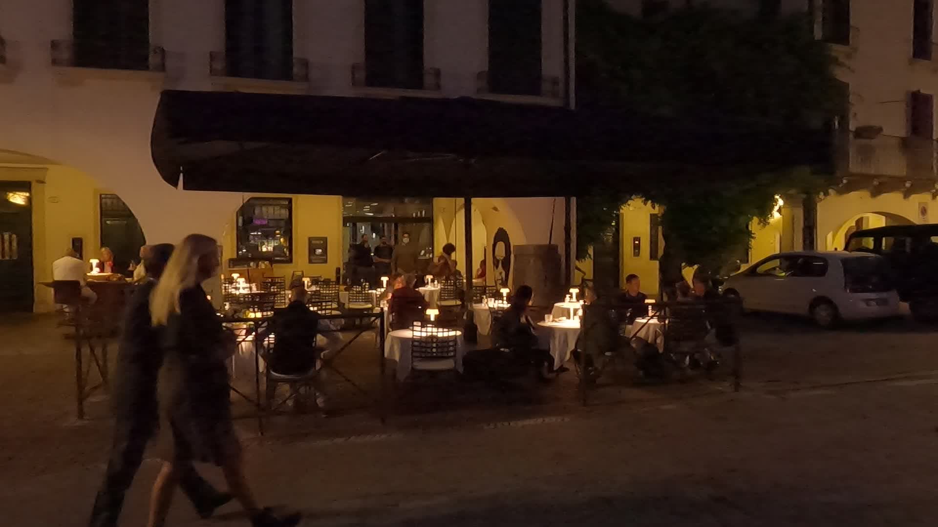 People dining out in Prato della Valle. 