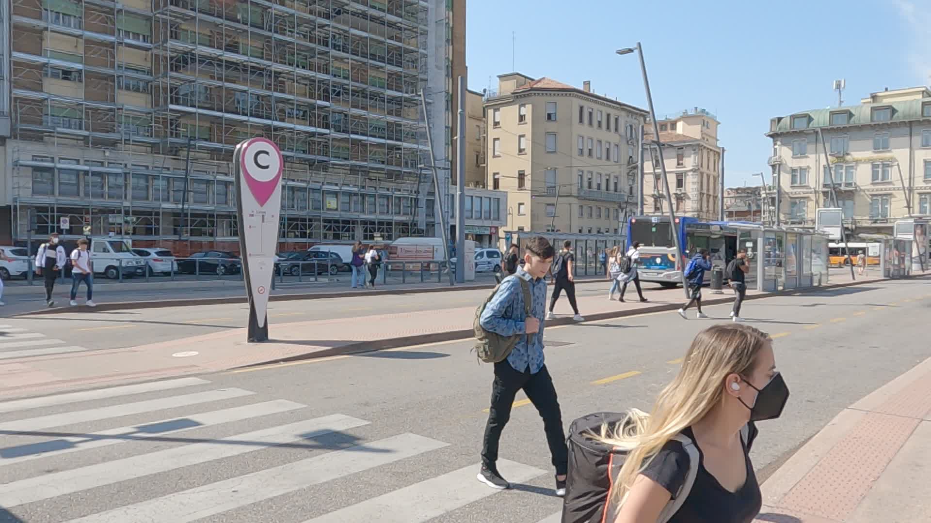 Boys crossing the Padua bus station