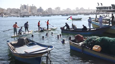 Volunteers in Gaza clean up the port