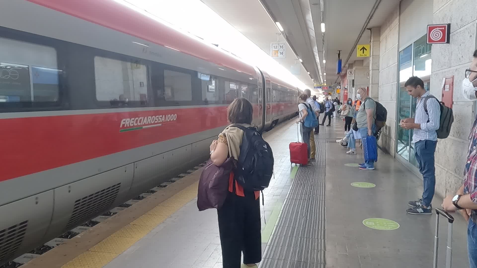 Passengers in Padua station as they take a high-speed train Padua