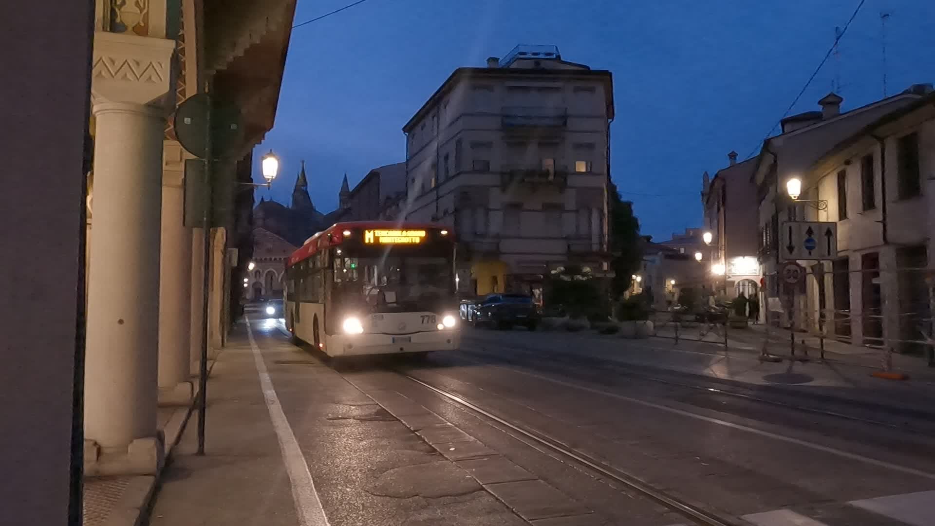 Passengers waiting for the tram in Prato della Valle in Padua