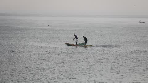Fishermen in boat a Gaza City