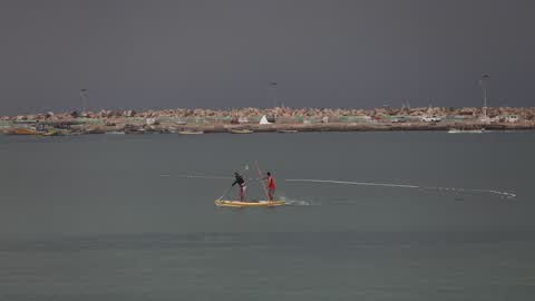 Fishermen in boat a Gaza City