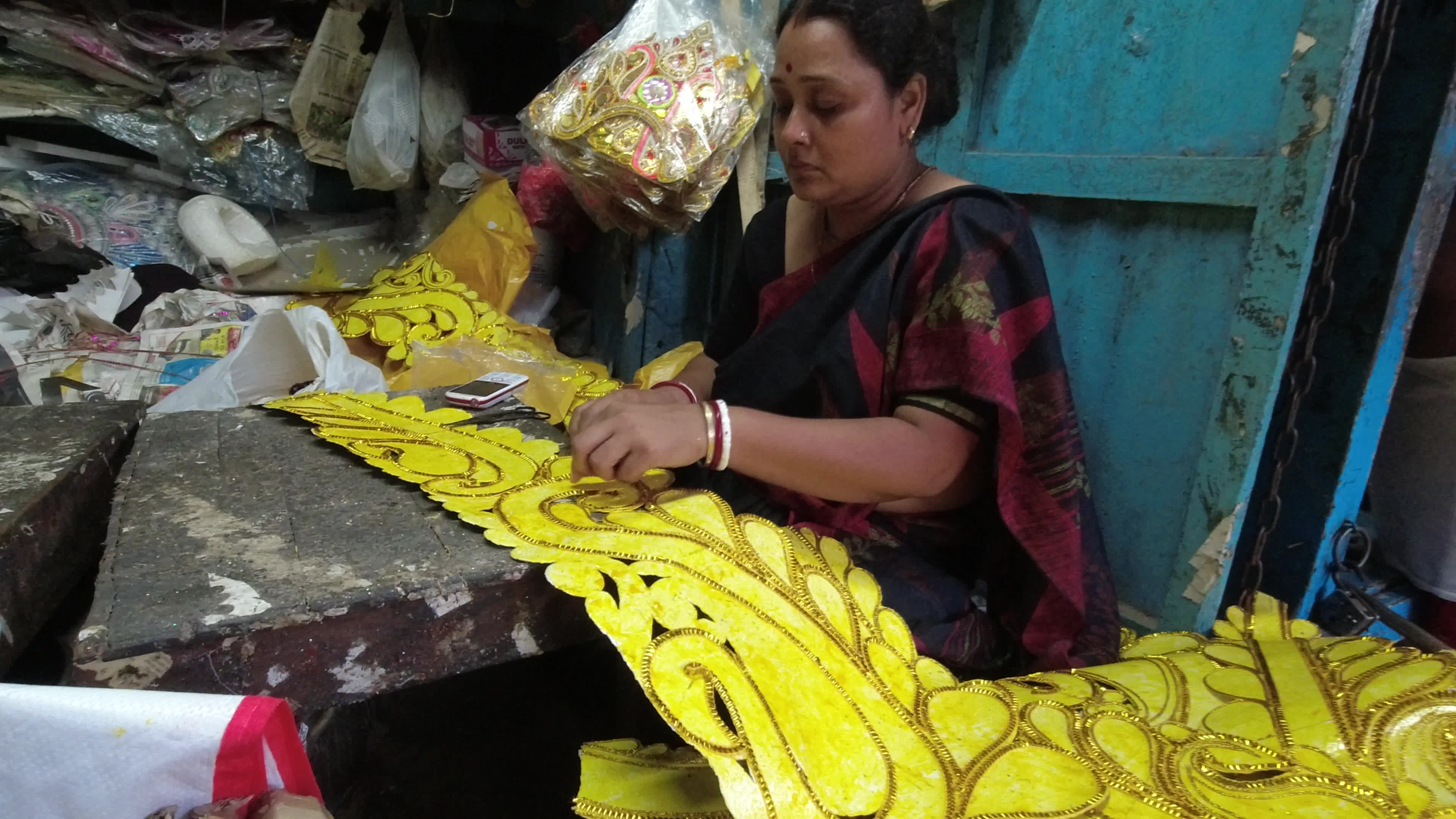 Making of " Daak er Saaj " or Styrofoam ornament of goddess Durga