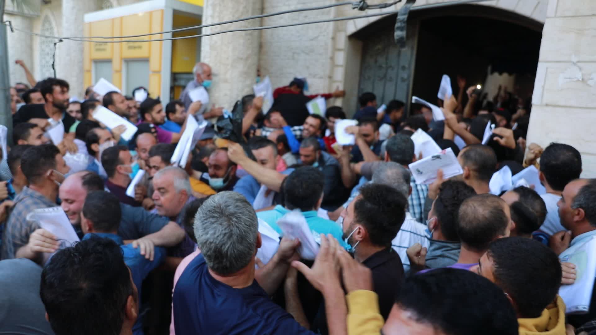 Tens of thousands in Gaza line up for Israeli work permits