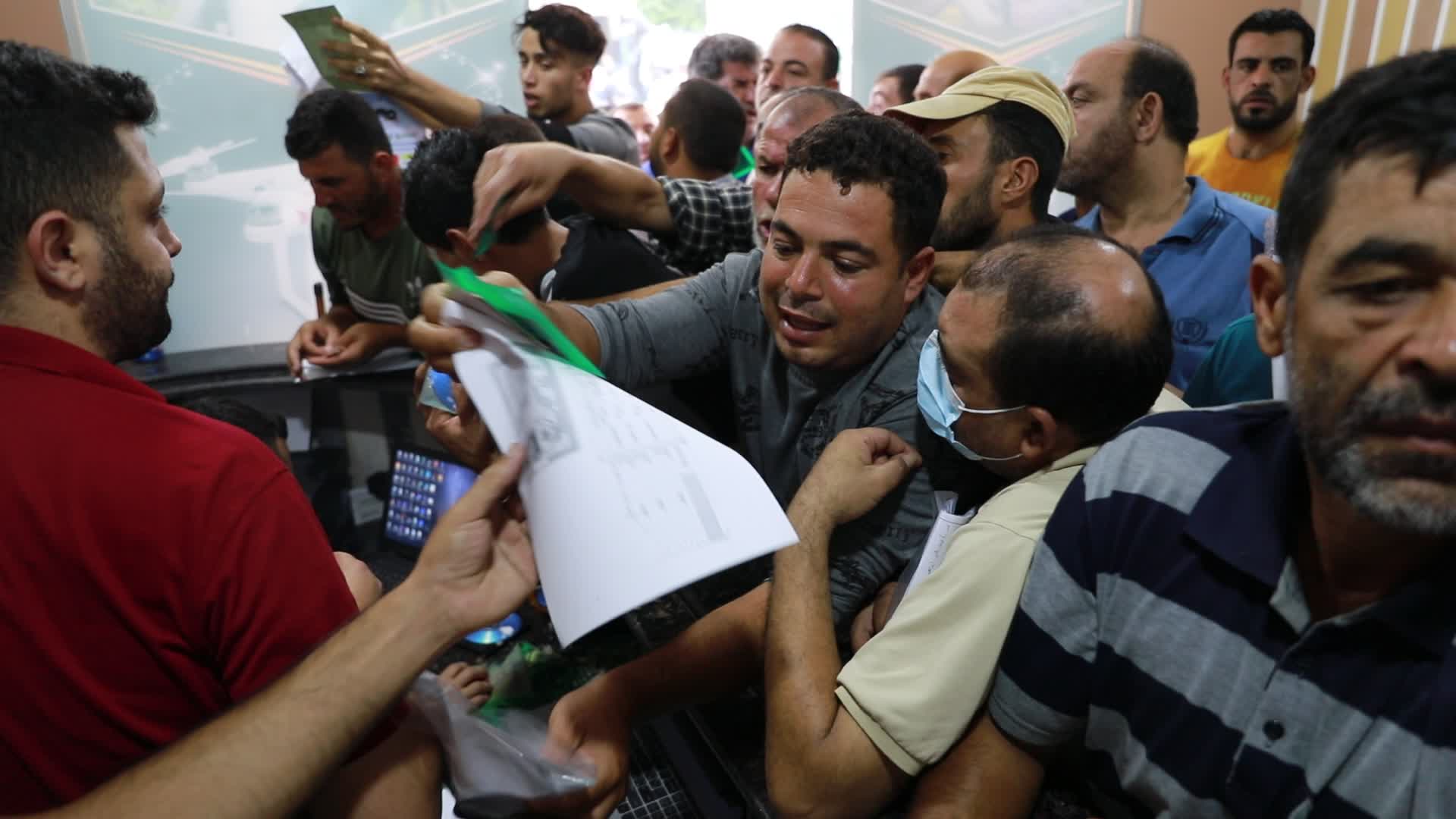 Tens of thousands in Gaza line up for Israeli work permits