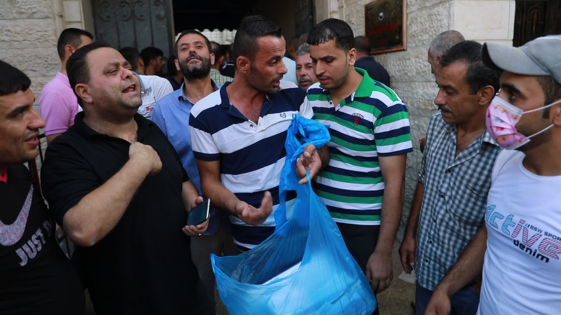 Tens of thousands in Gaza line up for Israeli work permits