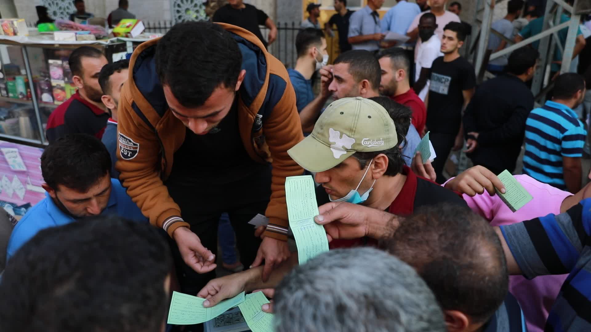Tens of thousands in Gaza line up for Israeli work permits