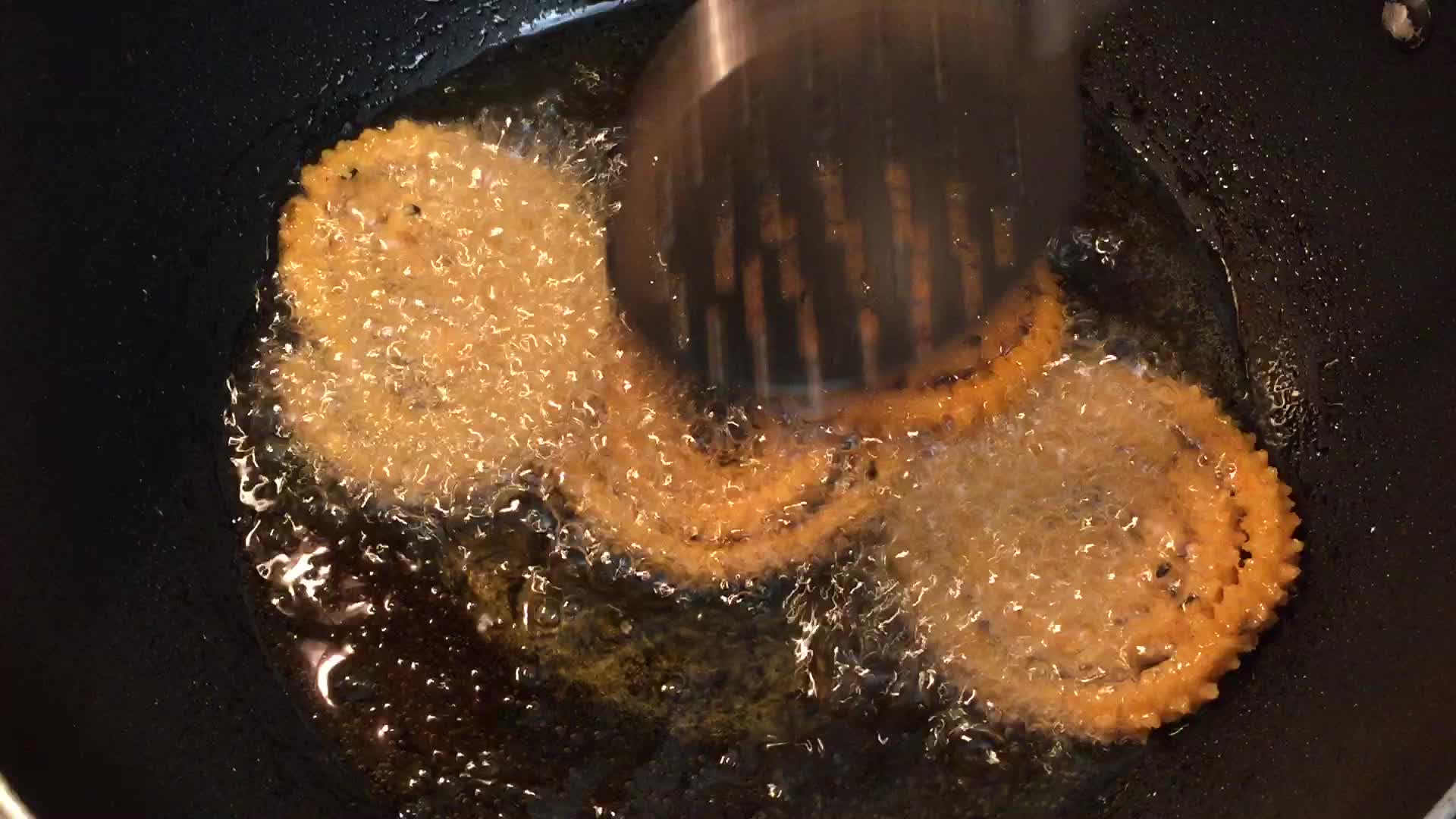 Murukku preparation at an Indian snack shop