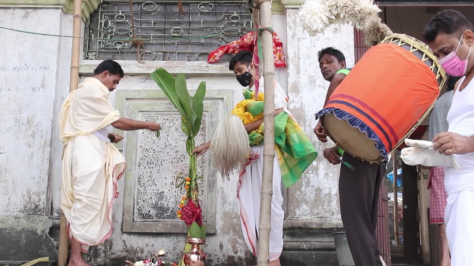 Indian Hindu devotees perform rituals during the Durga Puja