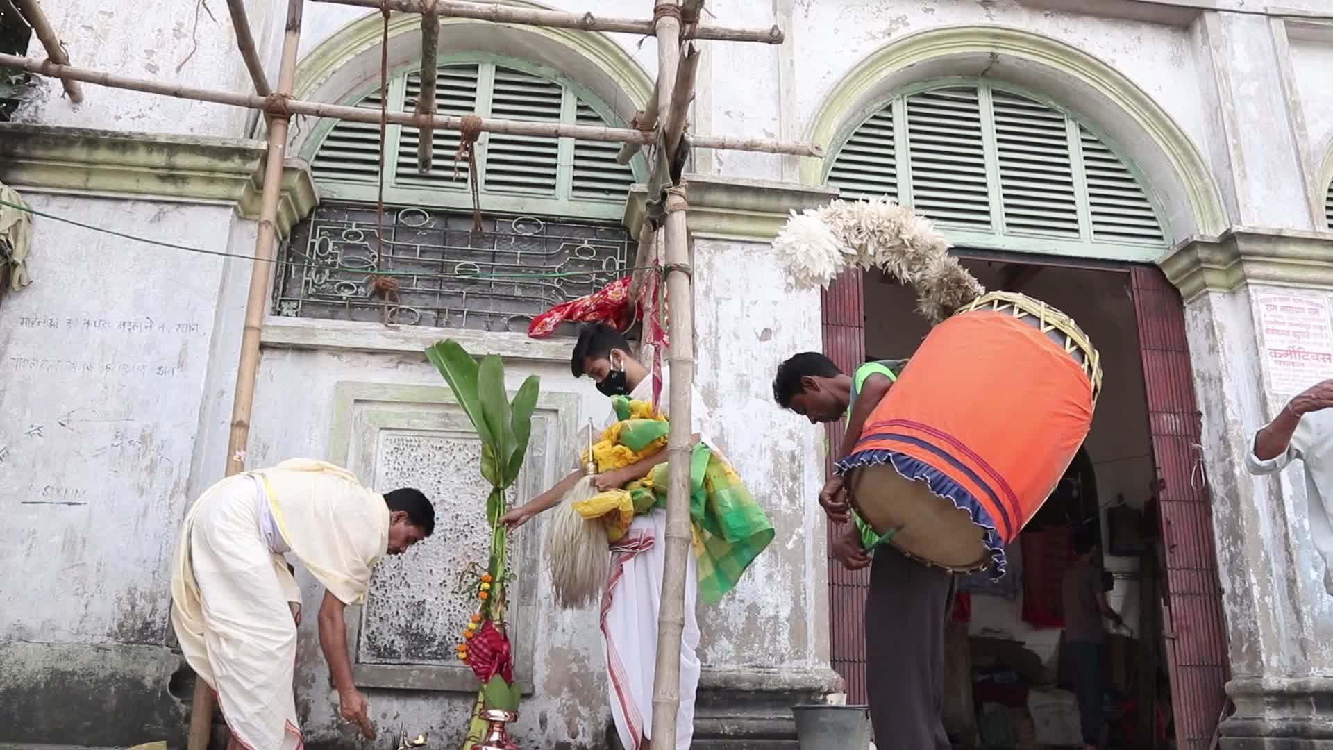 Indian Hindu devotees perform rituals during the Durga Puja