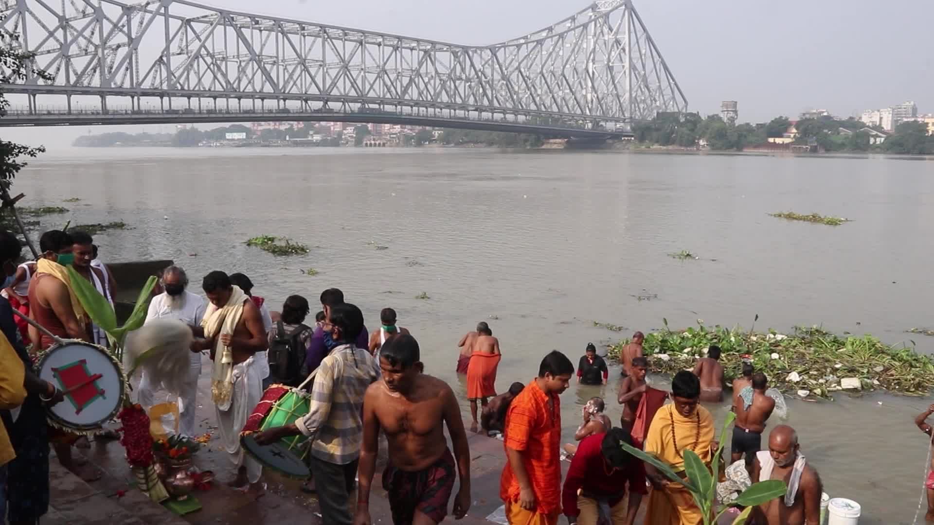 Indian Hindu devotees perform rituals during the Durga Puja