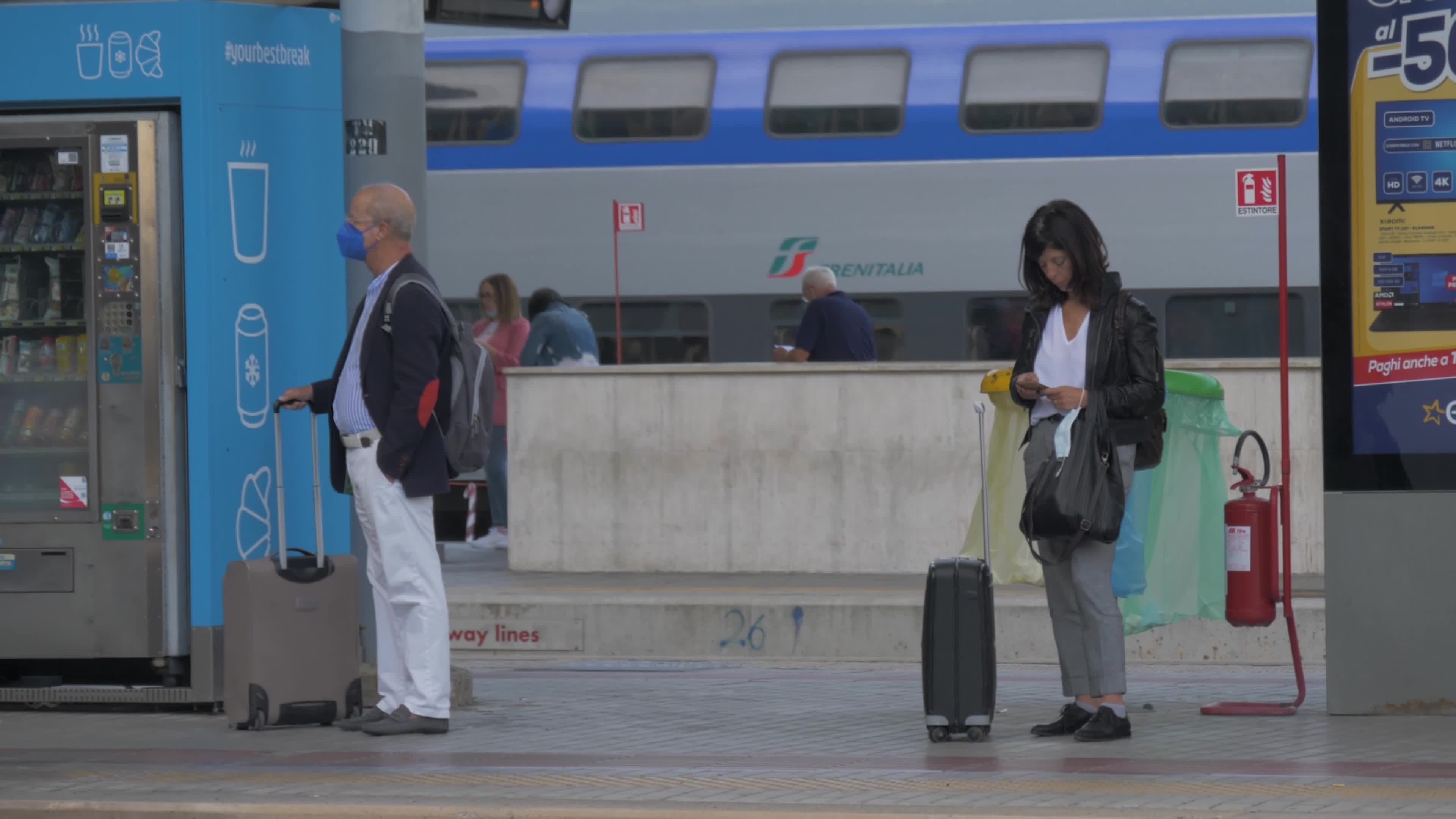 Tourists and workers who take a long-distance train (Green Pass Mandatory) at Tiburtina Station in Rome