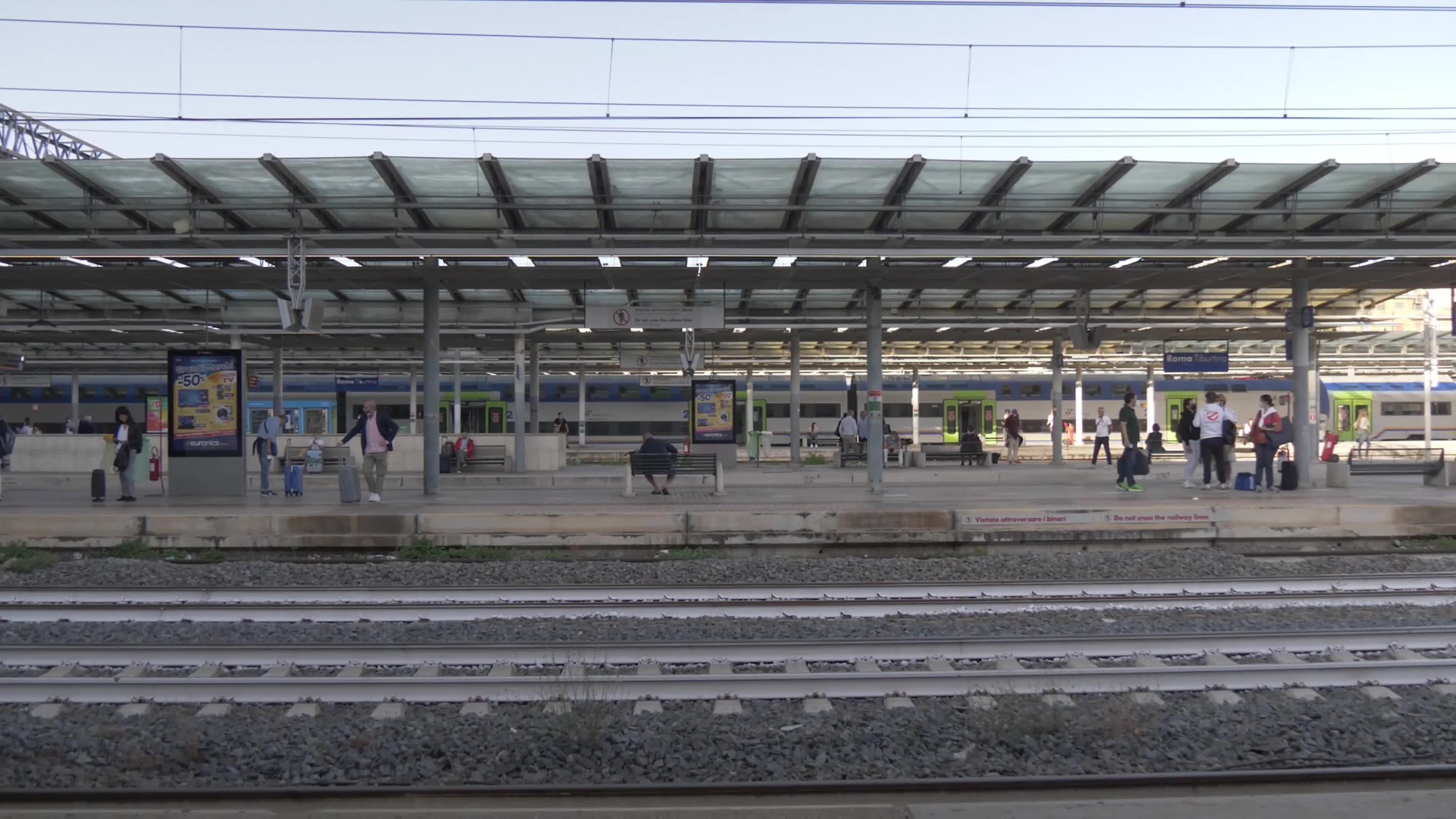 Tourists and workers who take a long-distance train (Green Pass Mandatory) at Tiburtina Station in Rome