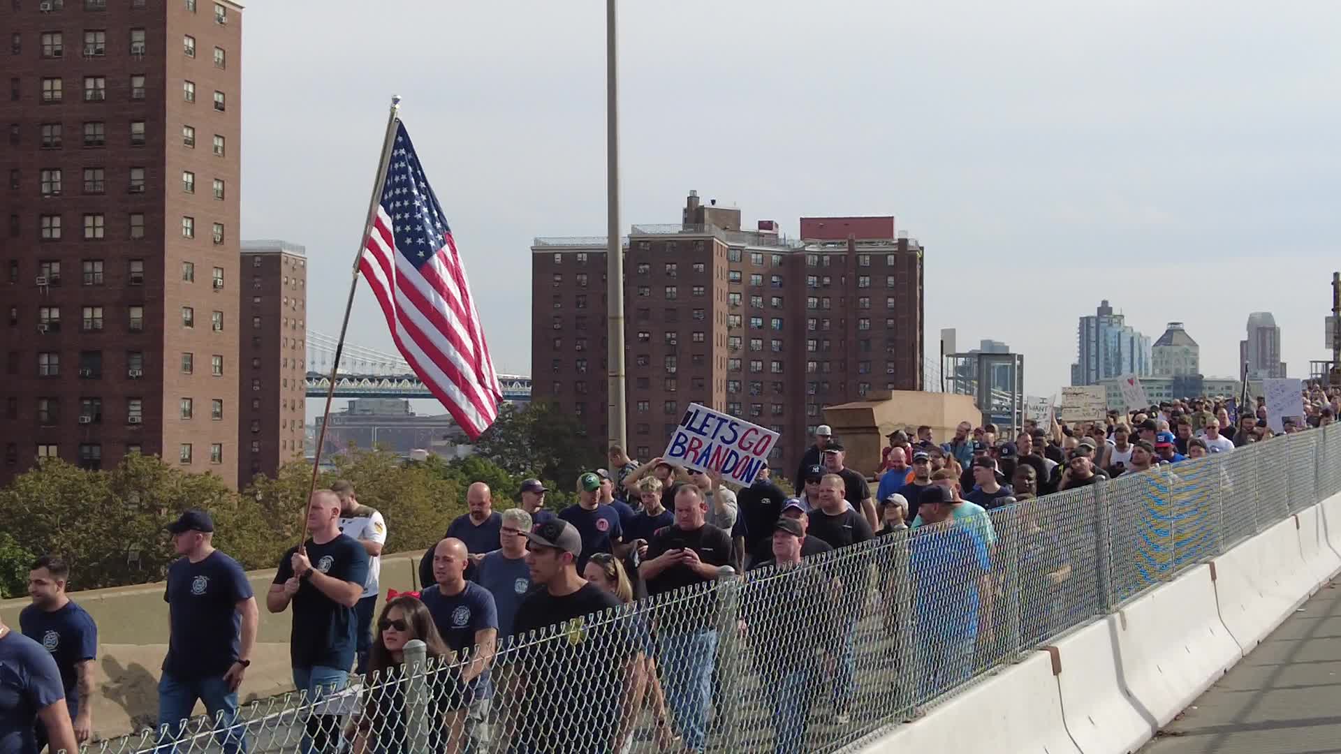 Anti Covid-19 protesters MarchAcross The Brooklyn Bridge in New York City