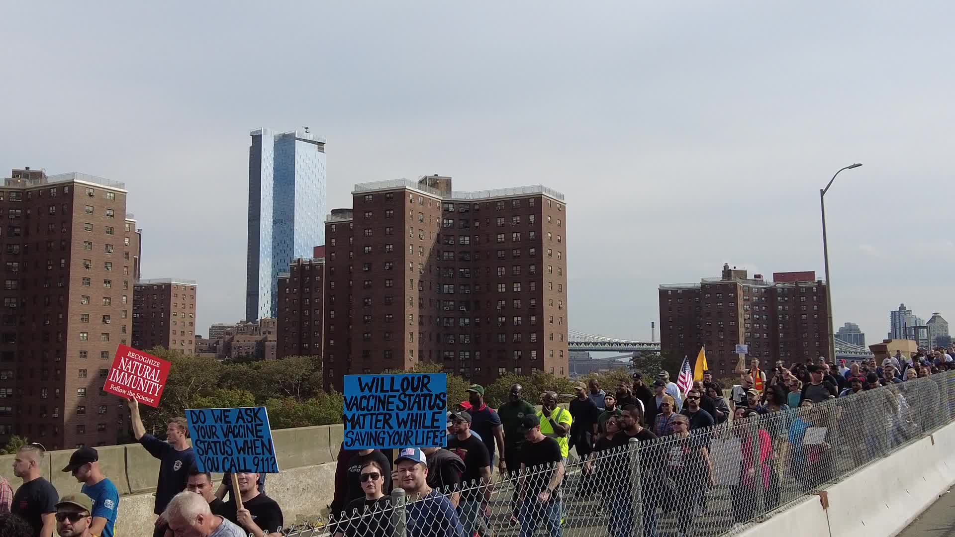 Anti Covid-19 protesters MarchAcross The Brooklyn Bridge in New York City