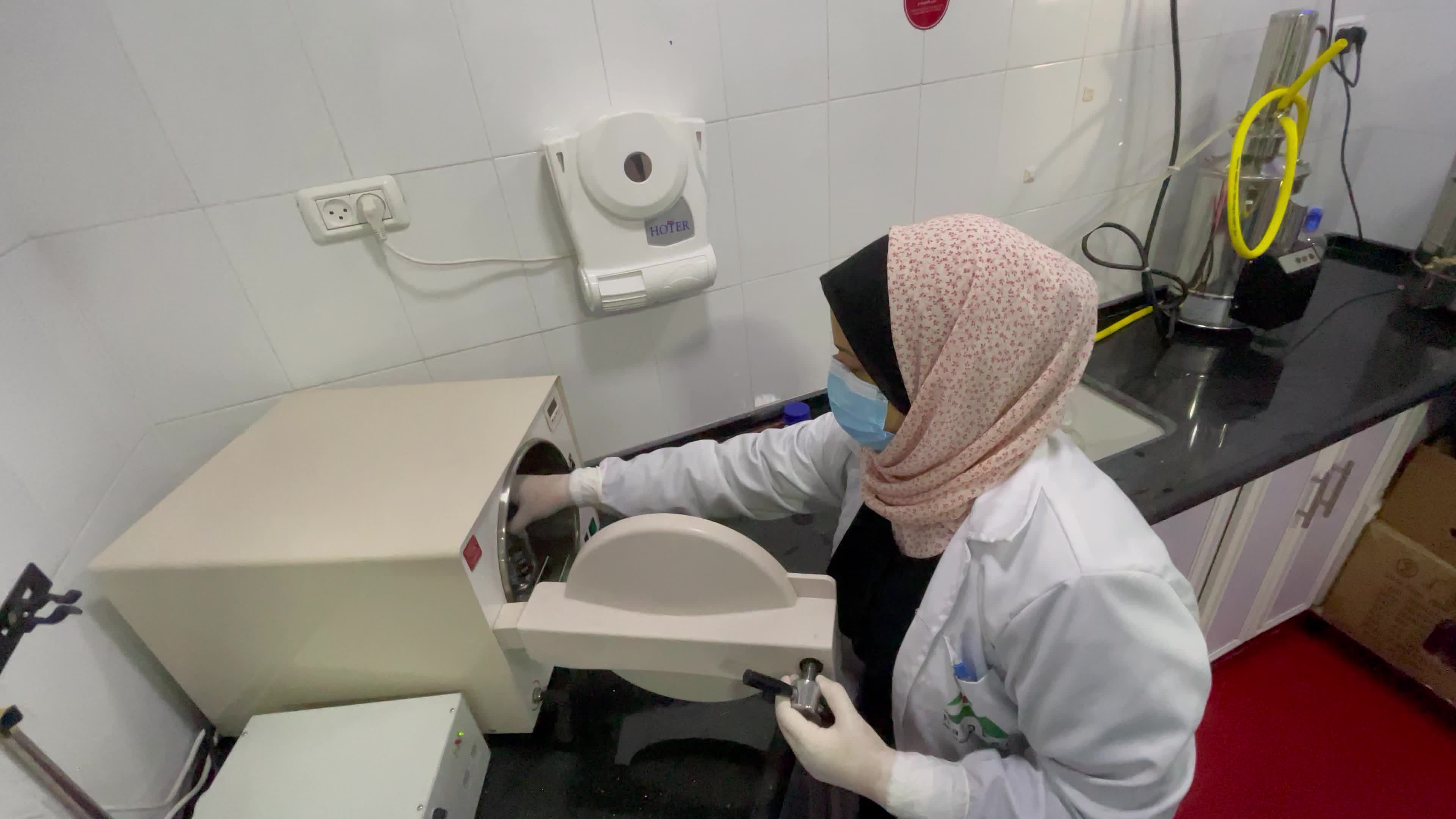 Palestinian employees work at Hanover factory for dairy