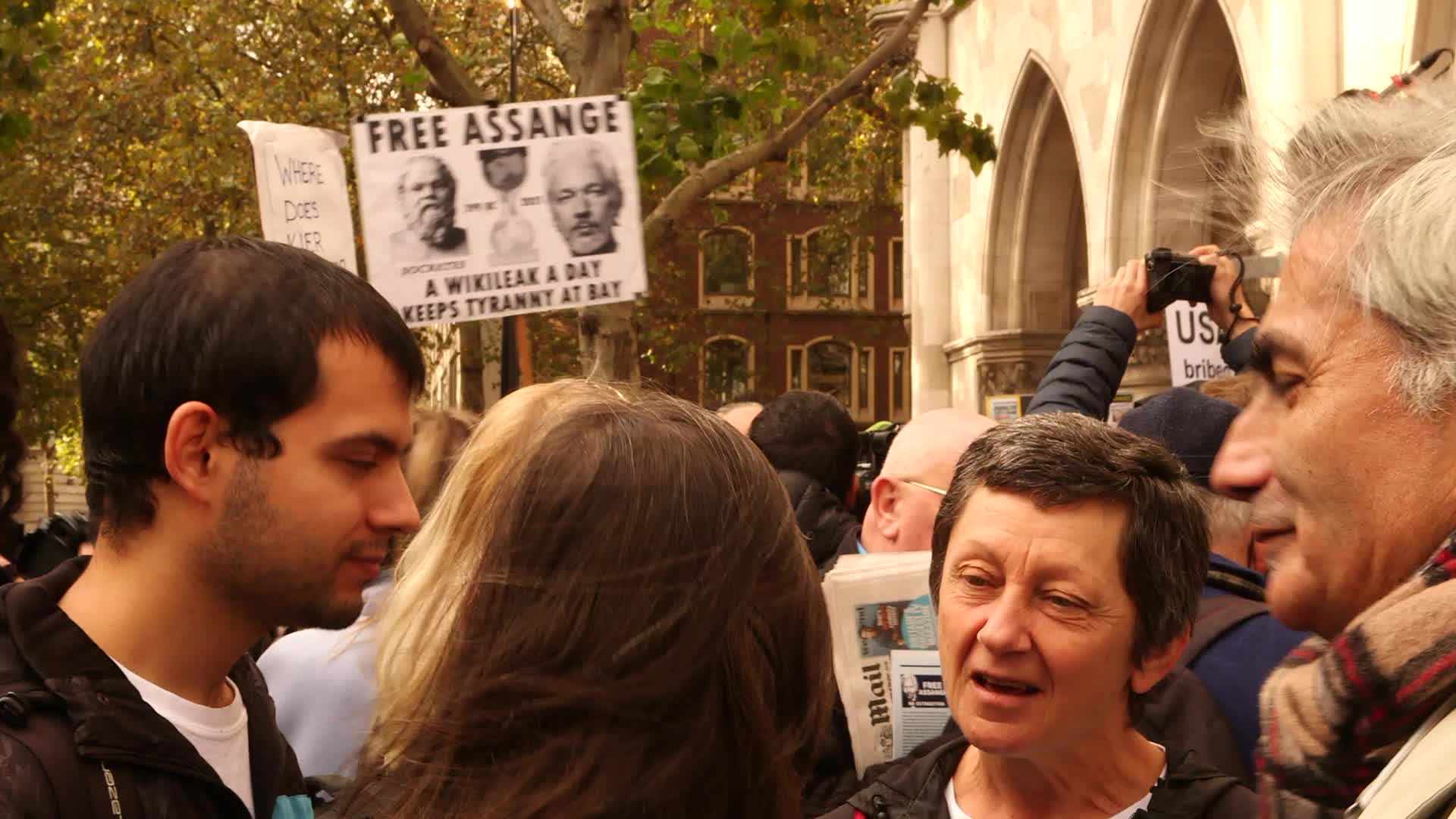 Supporters of Wikileaks founder Julian Assange protest in London