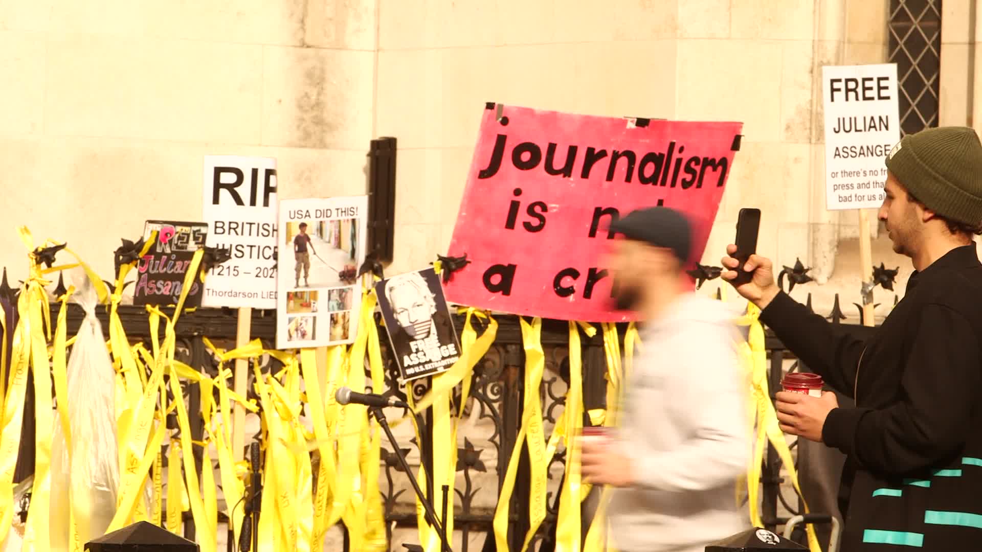 Supporters of Wikileaks founder Julian Assange protest in London