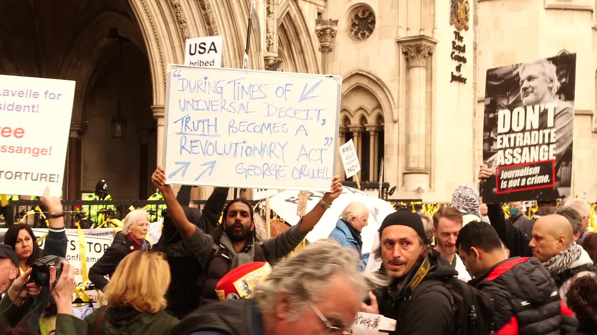 Supporters of Wikileaks founder Julian Assange protest in London