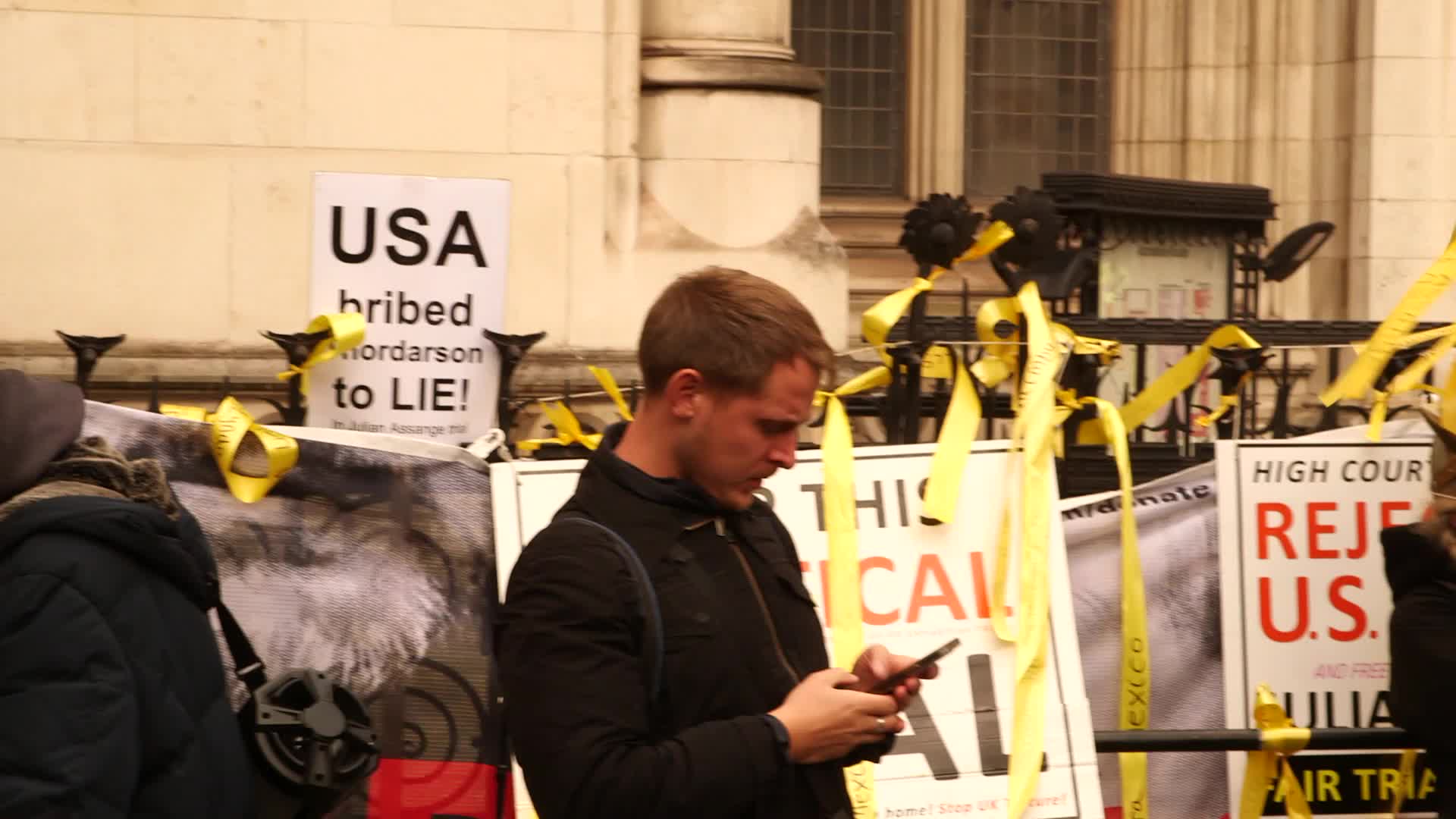 Supporters of Wikileaks founder Julian Assange protest in London