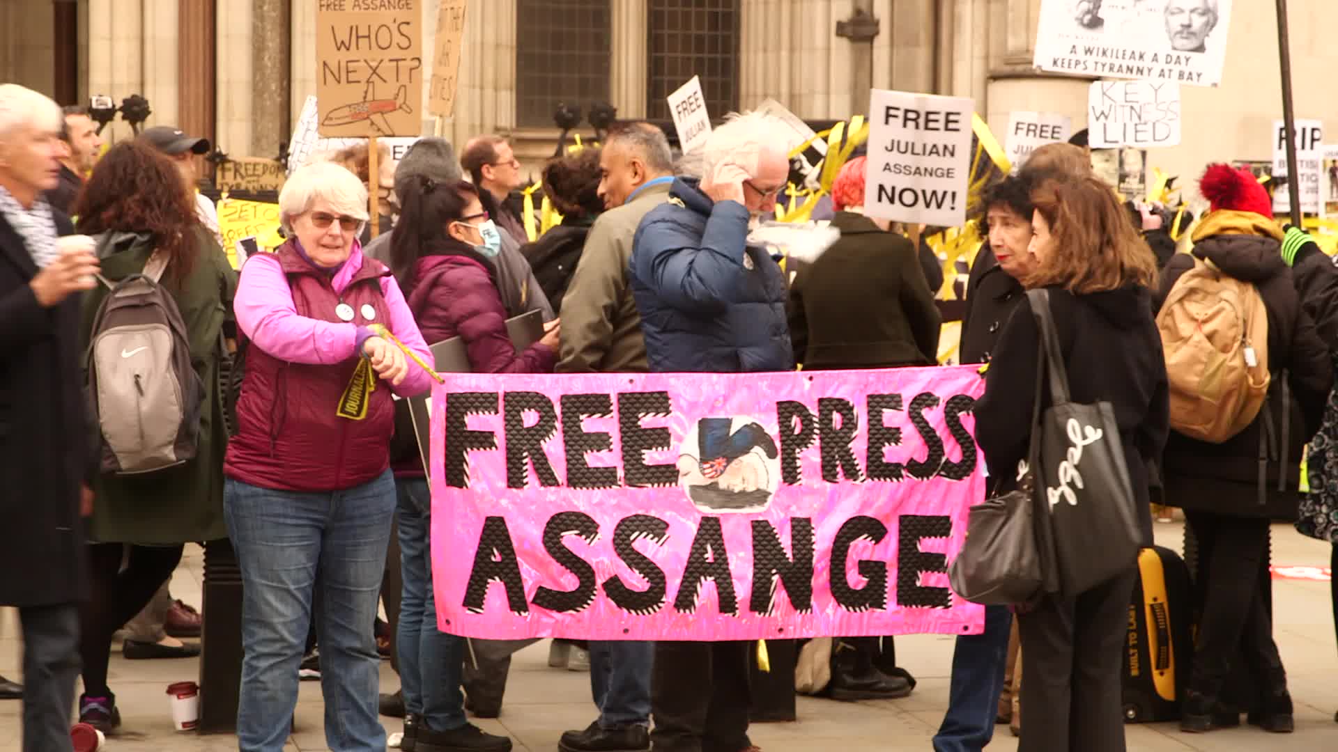 Supporters of Wikileaks founder Julian Assange protest in London