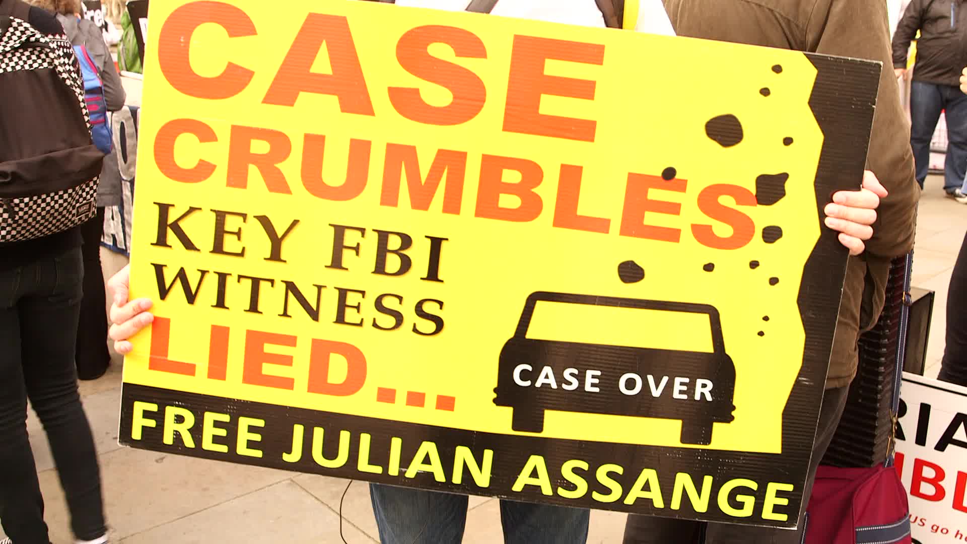 Supporters of Wikileaks founder Julian Assange protest in London