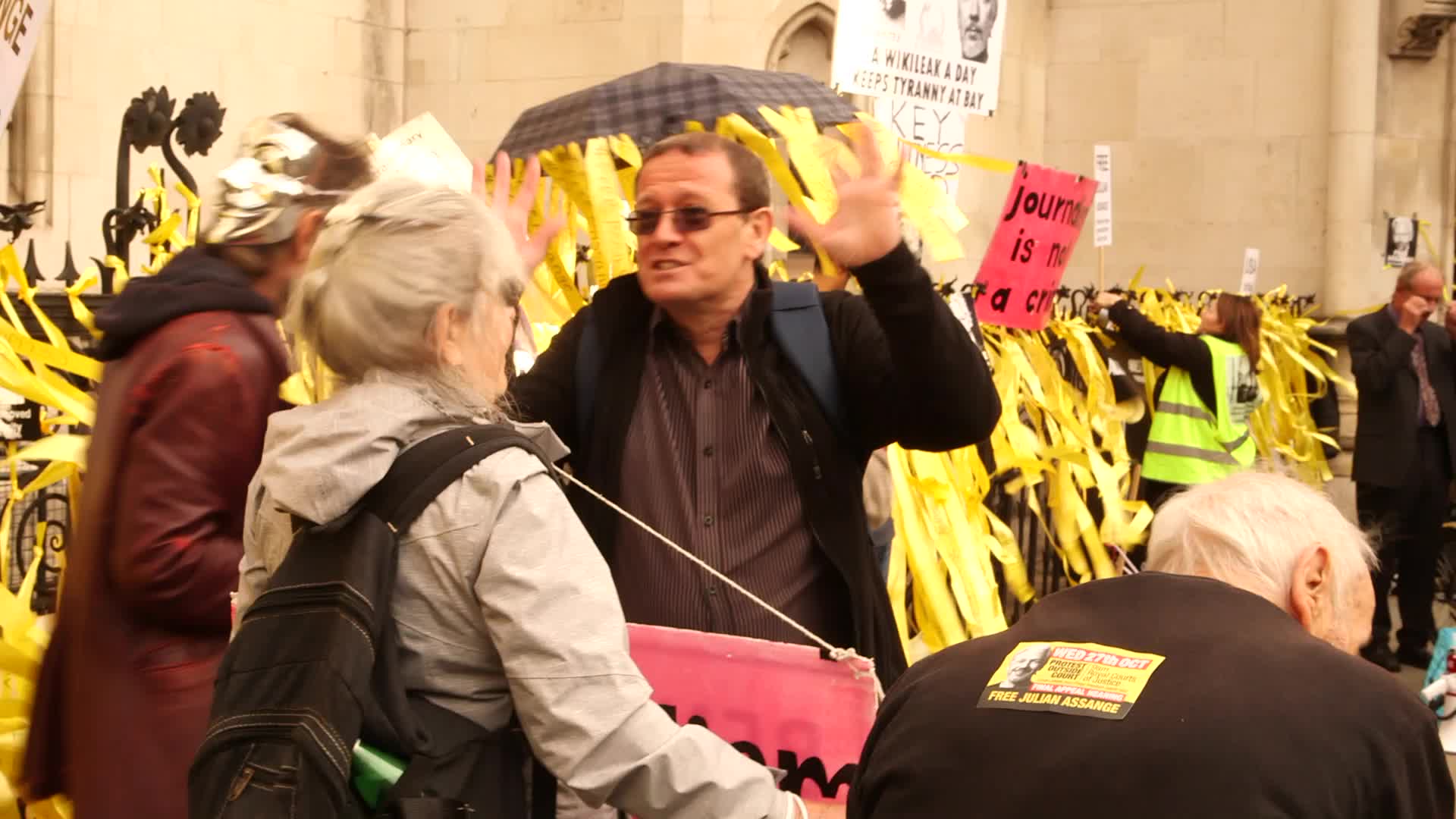 Supporters of Wikileaks founder Julian Assange protest in London