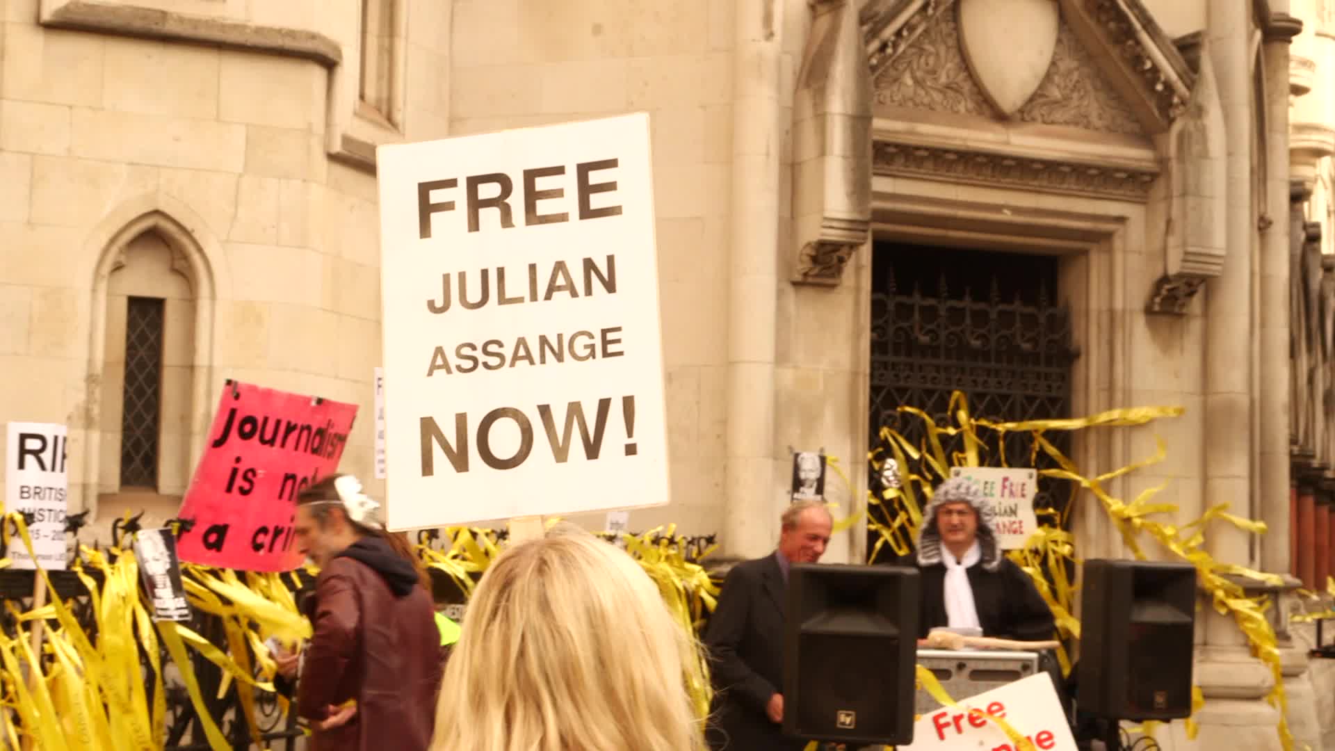 Supporters of Wikileaks founder Julian Assange protest in London